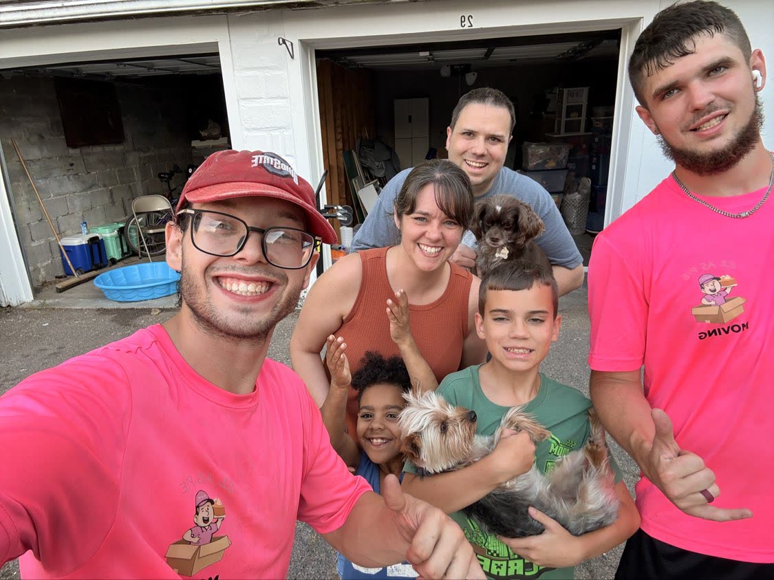 EZ As Pie mover with a local family and their dogs after a move