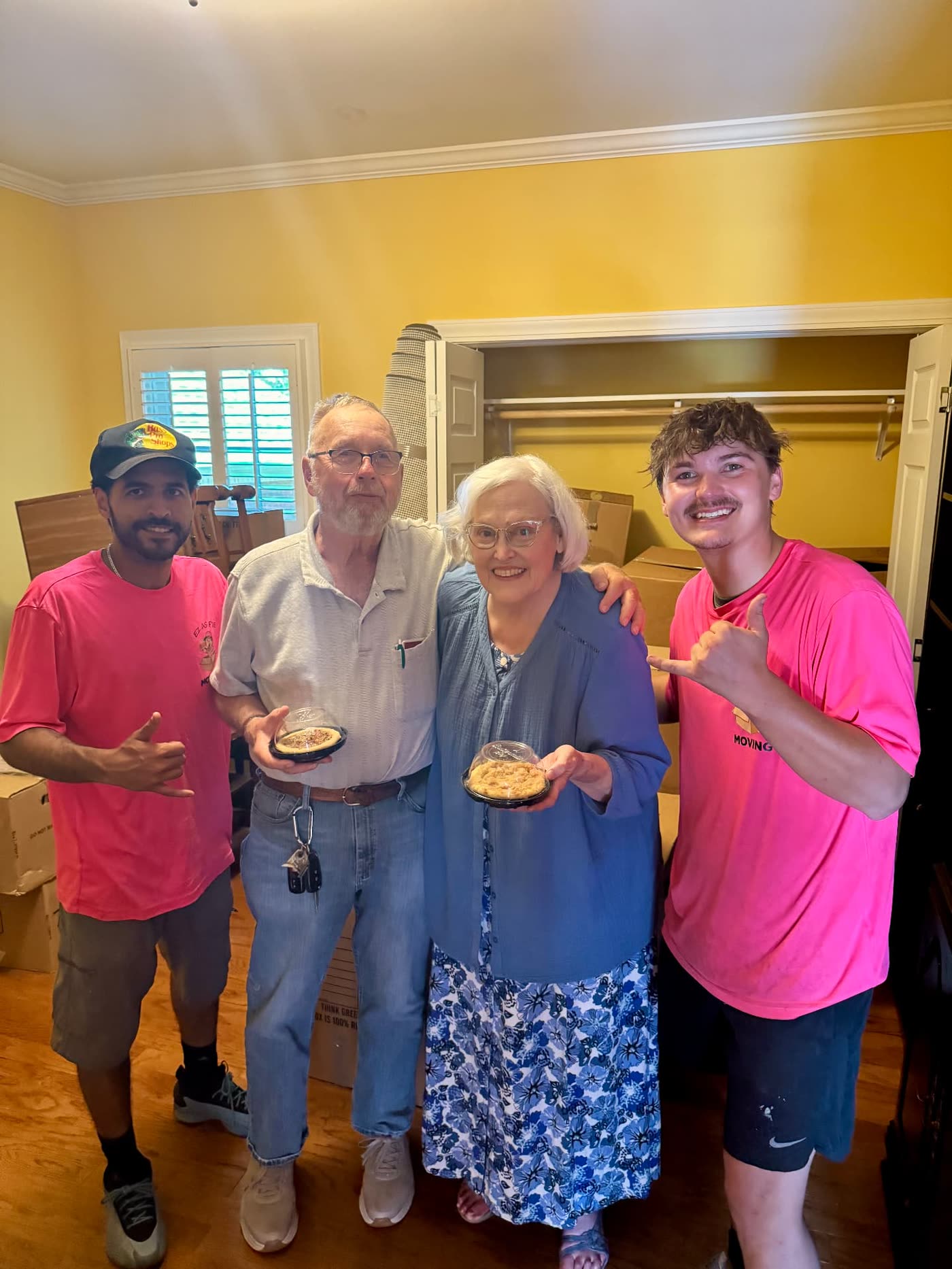 Customers holding their pies after an EZ As Pie move