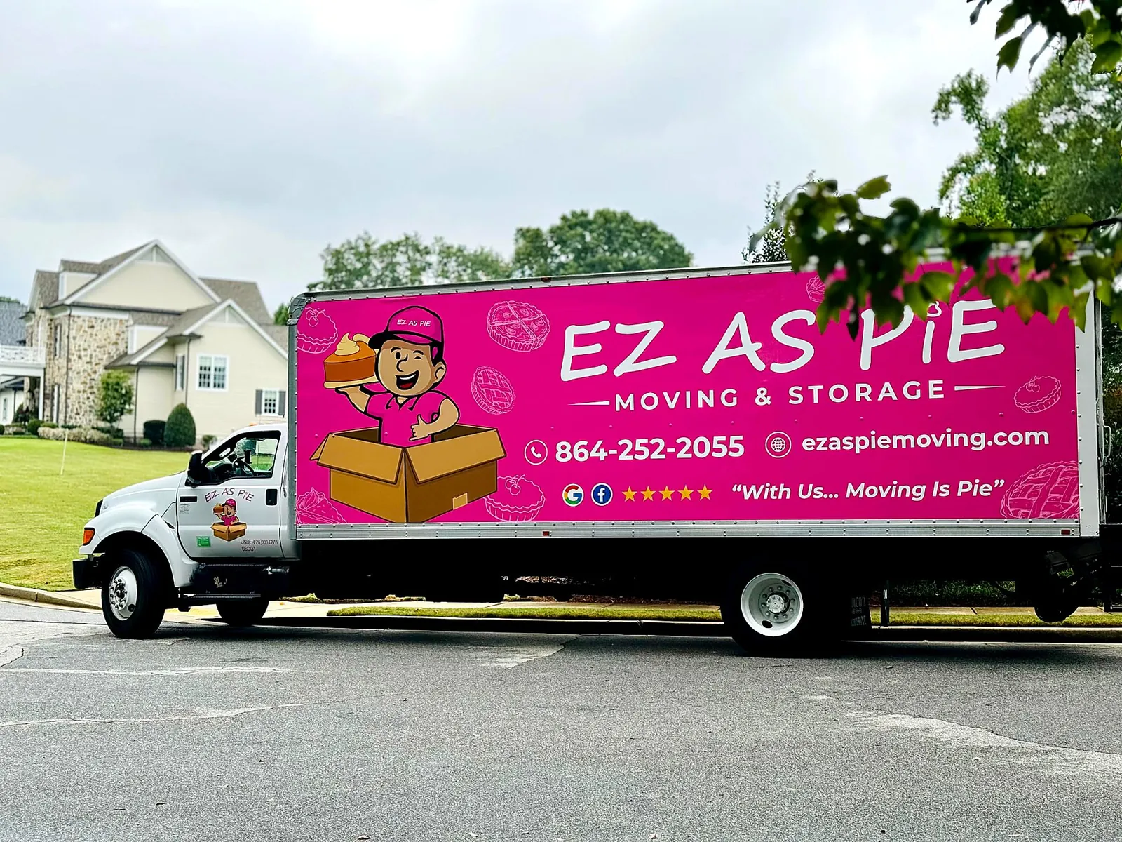 EZ As Pie pink moving truck parked outside an Upstate home